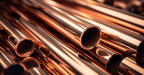 a group of copper pipes showing a view of them | © stock.adobe.com - GustavsMD